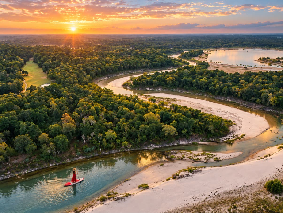 The river bend with open water and wide sky